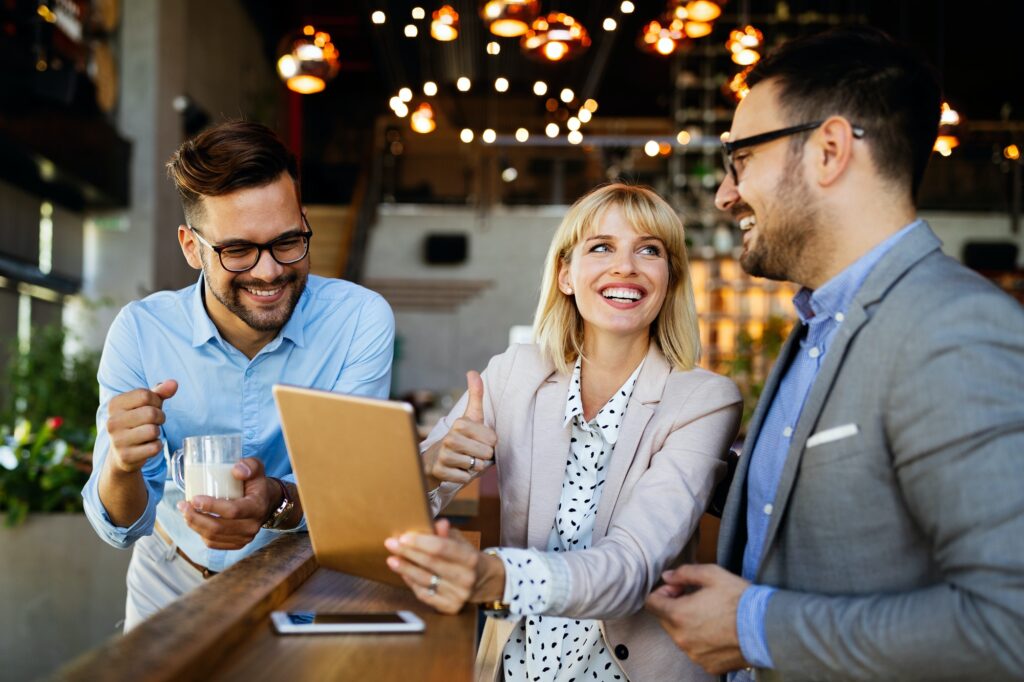 Successful company with happy employees in modern office